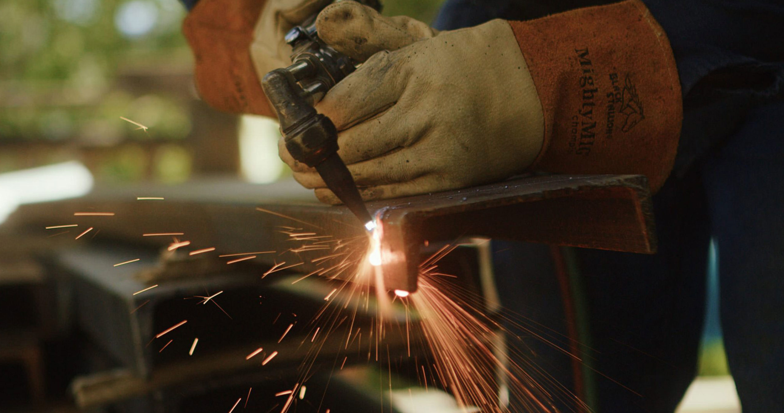 New-Thought-JLF-Architects-Video-Production-Design-Build-Dream-Welder-Cutting-C-Beam-fullscreen